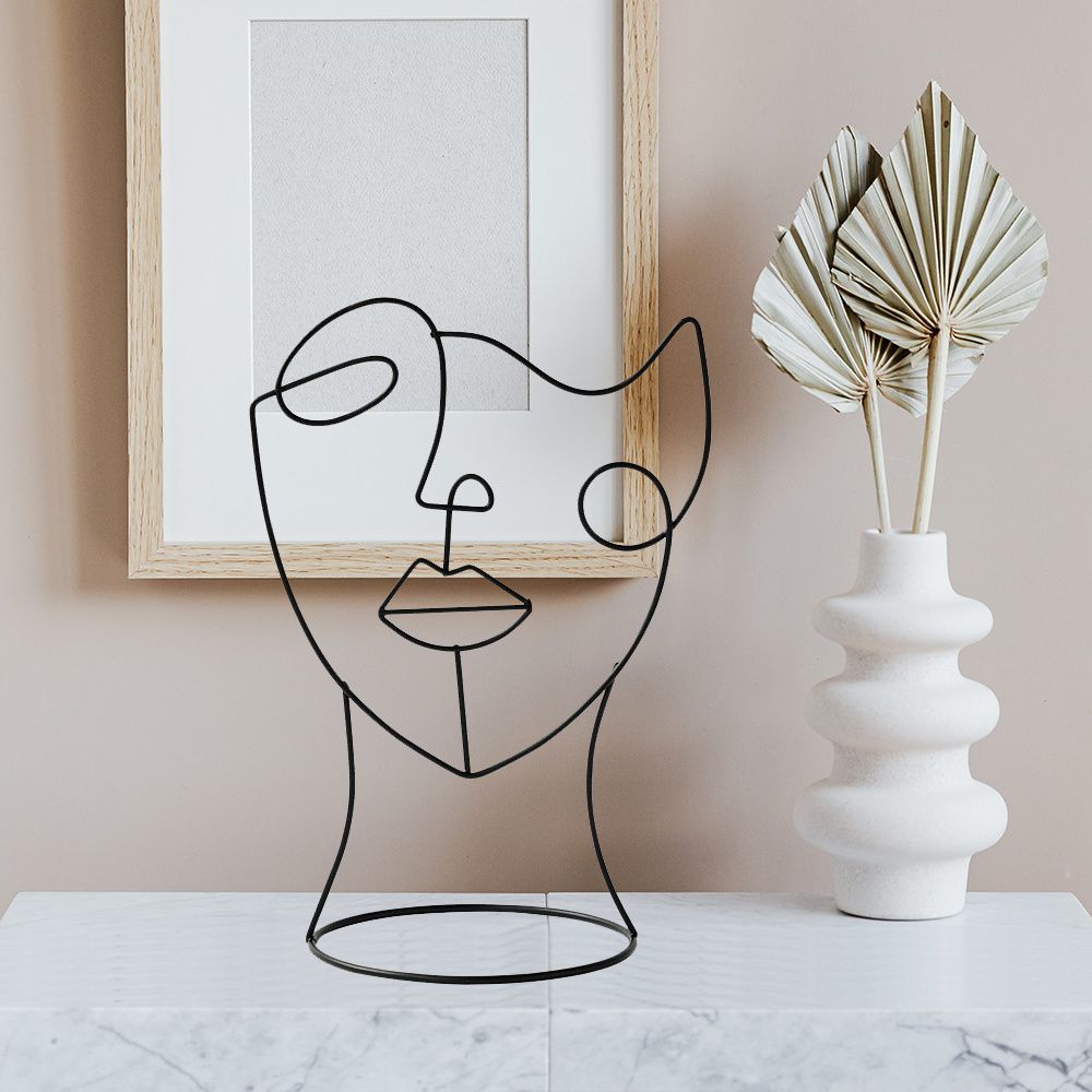 Escultura Abstrata Facial de Ferro