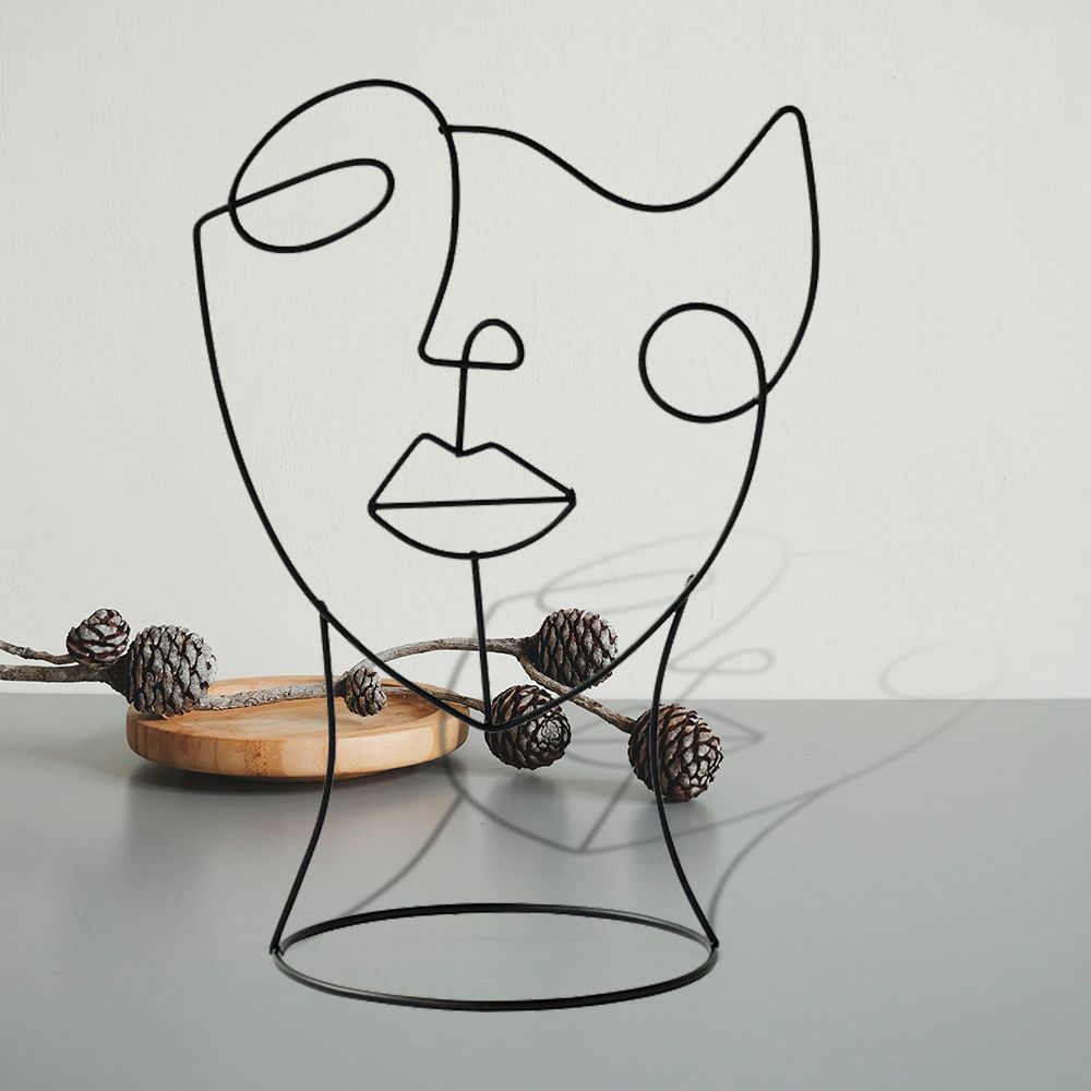 Escultura Abstrata Facial de Ferro