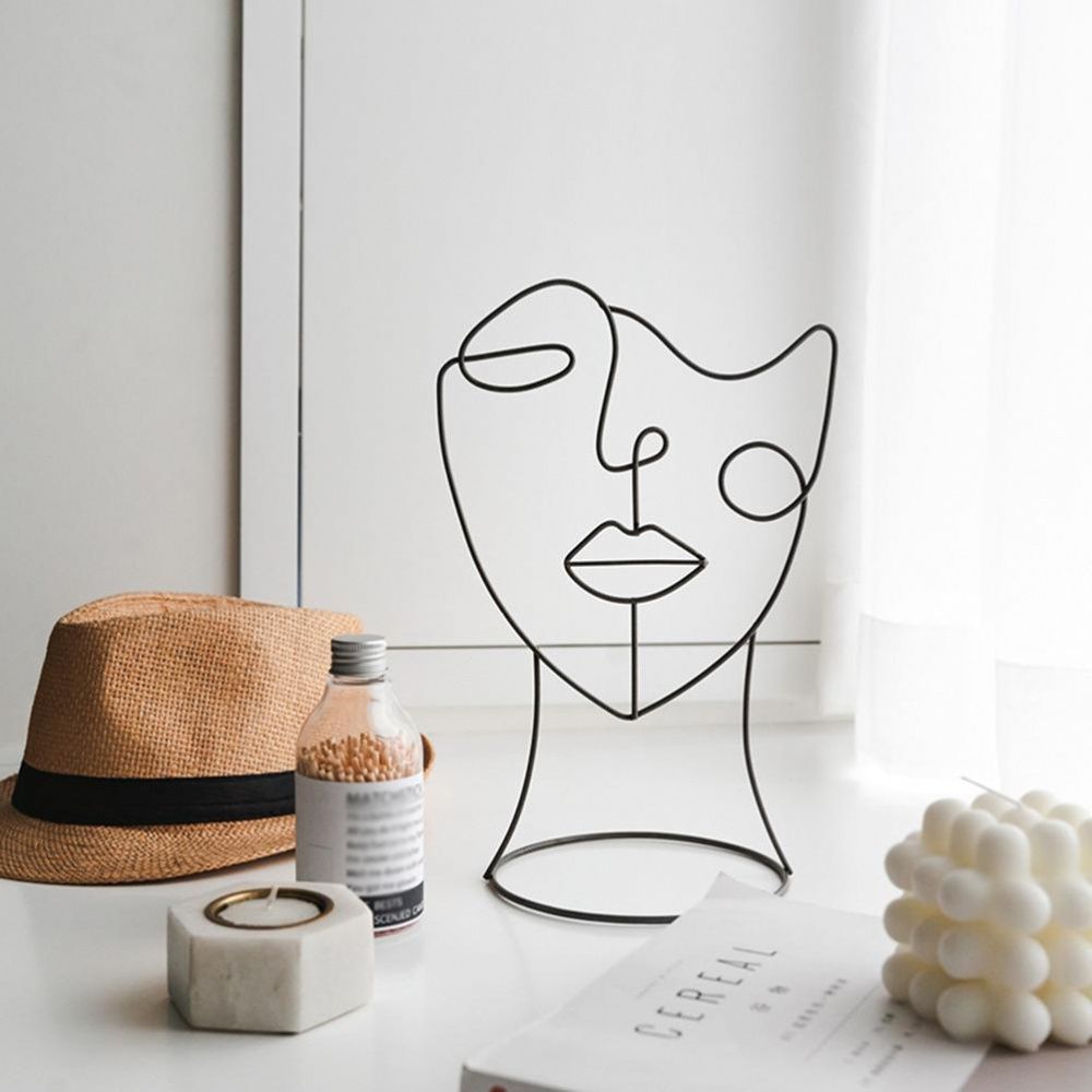 Escultura Abstrata Facial de Ferro