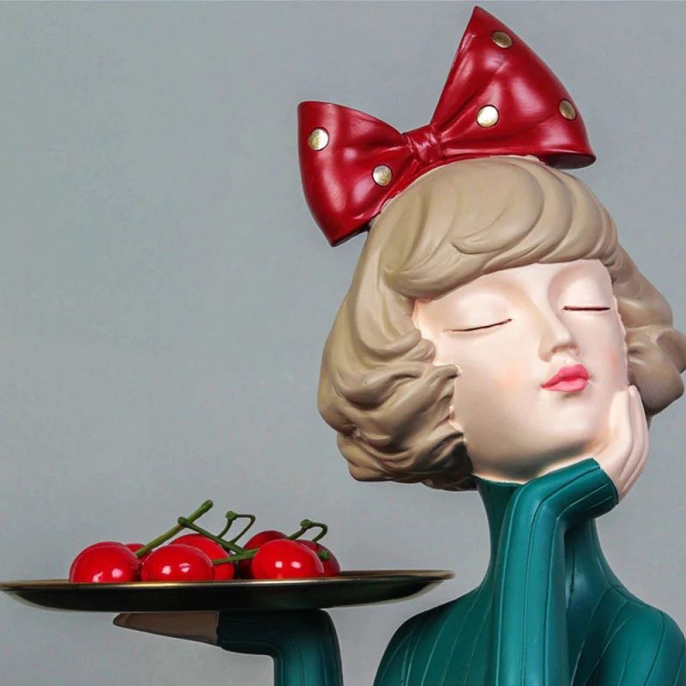 Estátua Alice Pensativa