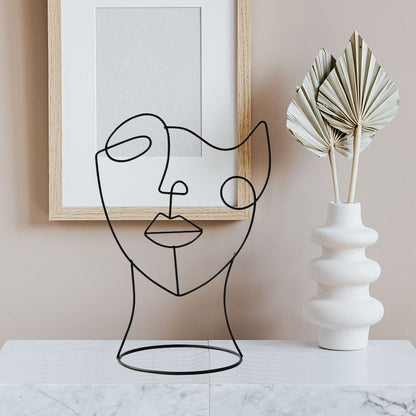 Escultura Abstrata Facial de Ferro